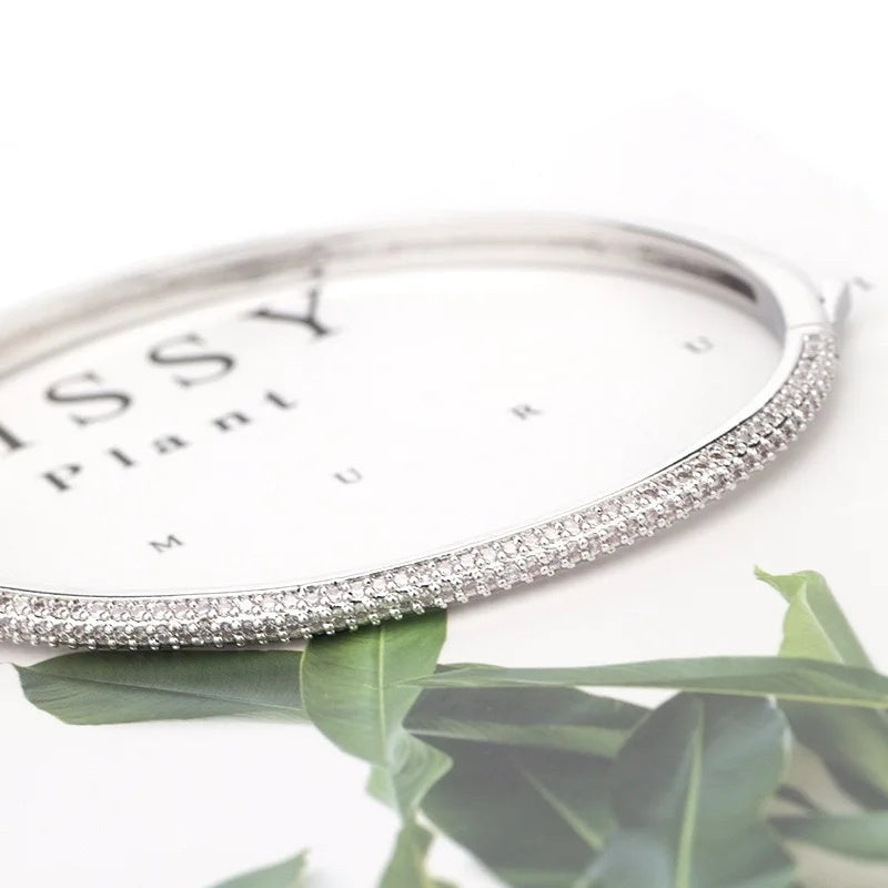 Nira .925 Sterling Silver Round Edge CZ Bangle Bracelet